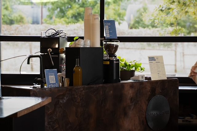 MAWA Coffee espresso bar with grinder, cups and menu at a corporate event in San Antonio